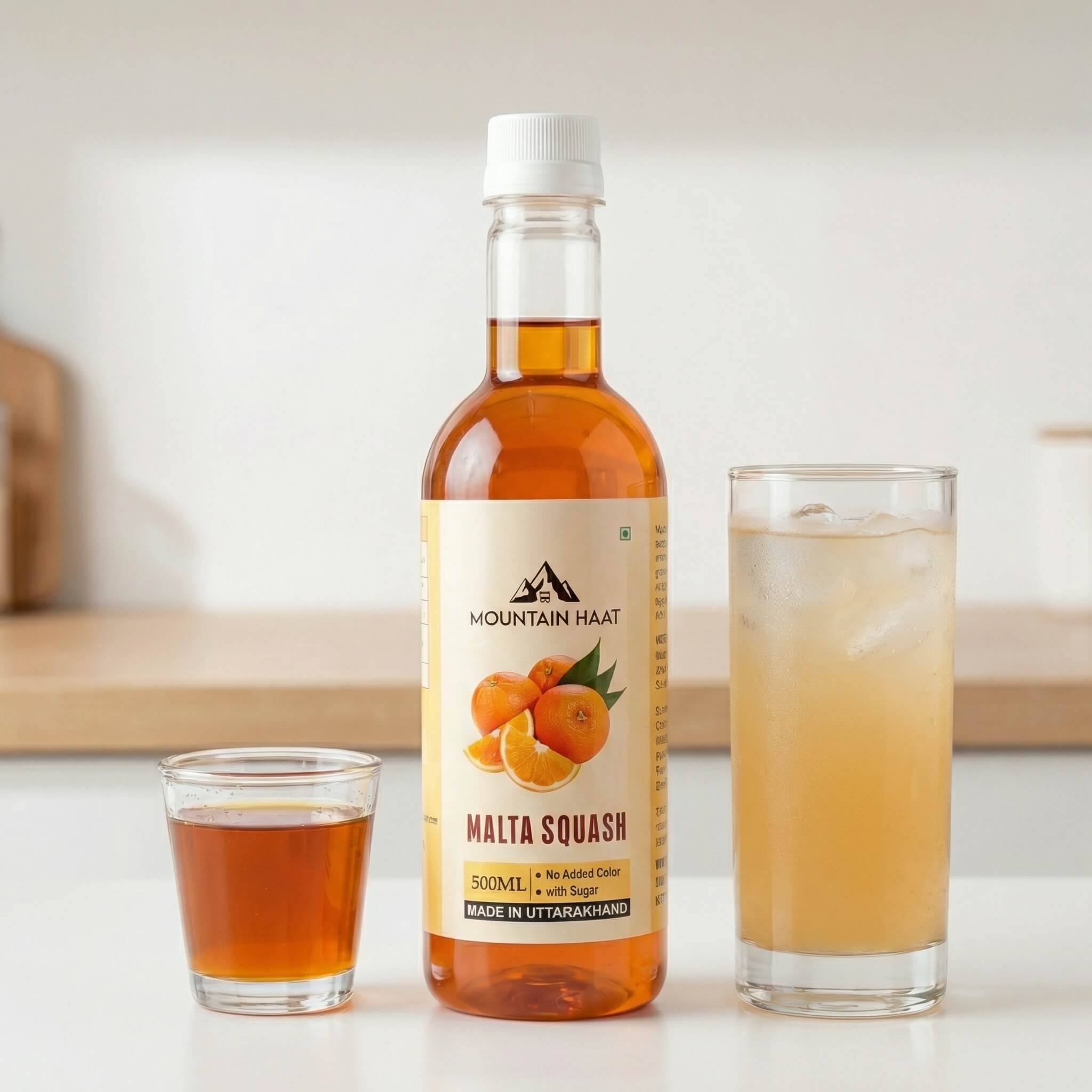 Mountain Haat Malta Squash 500ml showing concentrate and diluted ready-to-drink version.